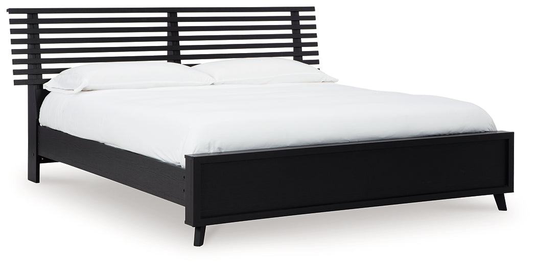 Danziar Queen Panel Bed with Mirrored Dresser and Nightstand