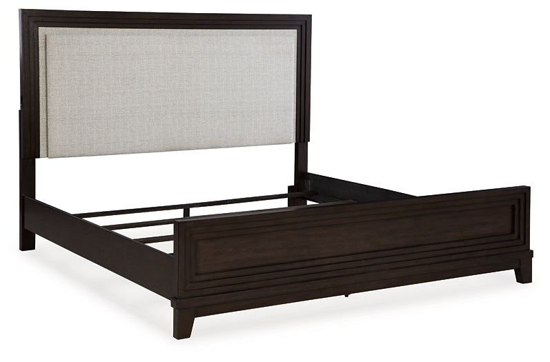 Neymorton King Upholstered Panel Bed with Mirrored Dresser and Chest